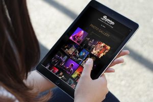 photo gallery on iPad from website redesign for Beginnings Chicago Tribute Band