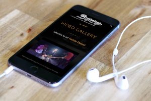 video page from website redesign for Beginnings Chicago Tribute Band