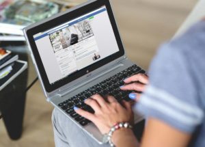 woman browsing a business Facebook page